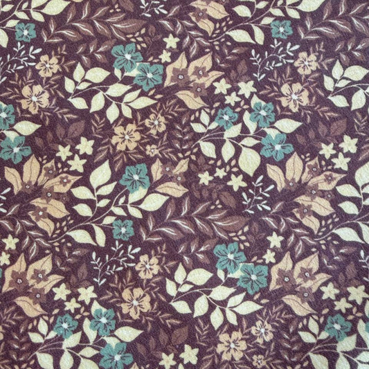 Quilted cotton jersey fabric with floral print in brown and turquoise tones