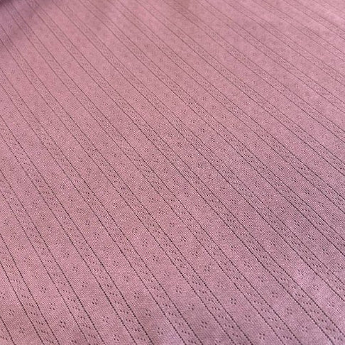 Delicate pointelle knit fabrics with soft textured pattern
