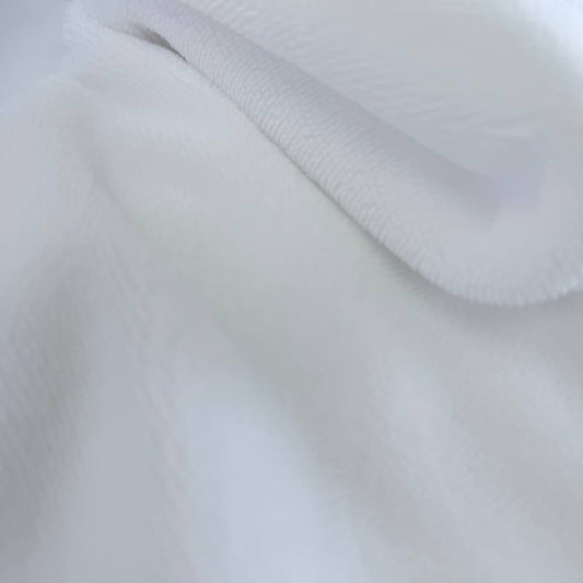 Soft white bamboo terry fabric texture close-up plush absorbent surface