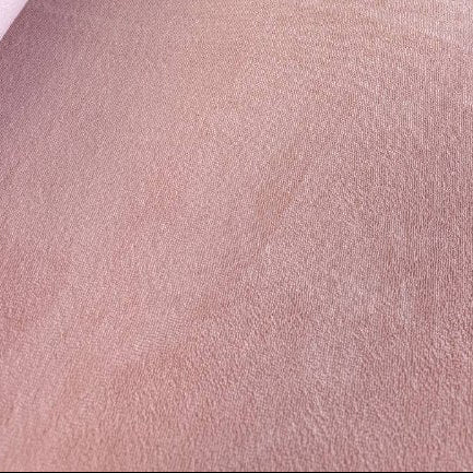 Blush pink bamboo wellness terry fabric with soft textured loop surface