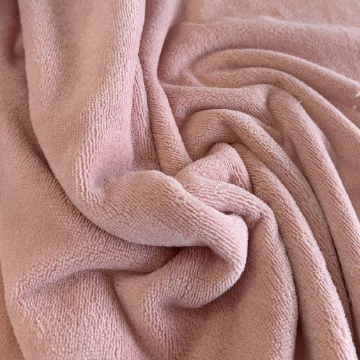 Blush pink bamboo wellness terry fabric with soft textured loop surface