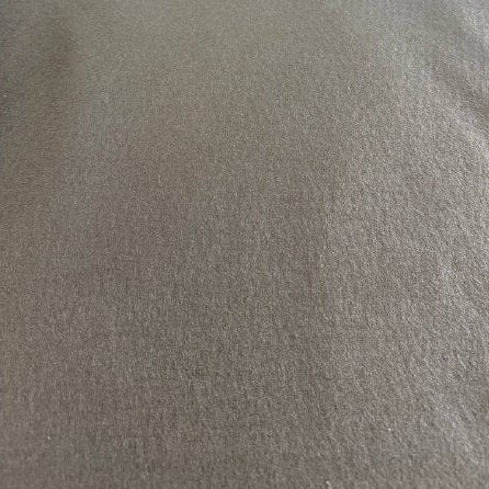 Black felt fabric texture close-up
