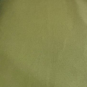 Heavy khaki cotton canvas fabric folded, textured durable material