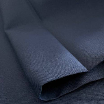 Heavy canvas fabric in denim blue color close-up texture