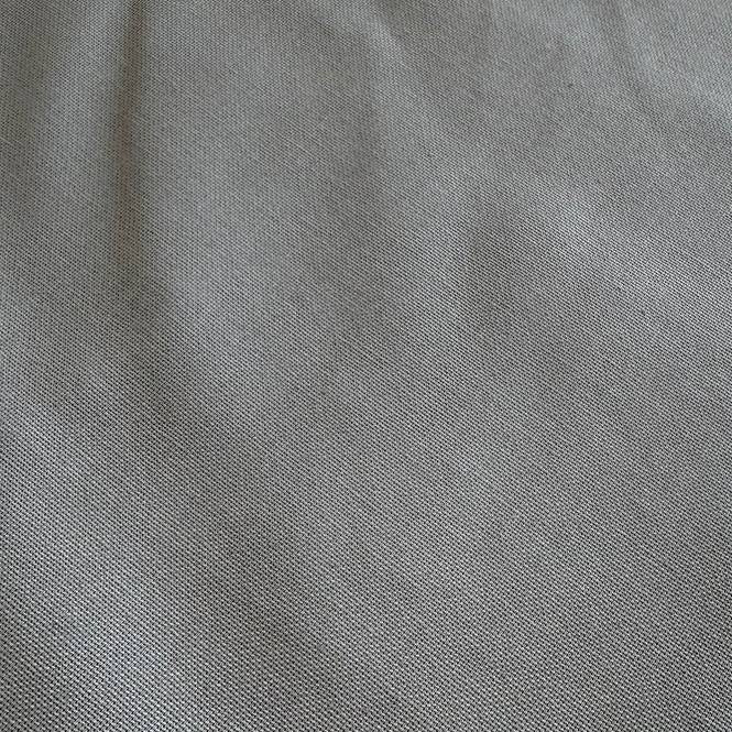 Heavy steel grey canvas fabric roll with visible texture