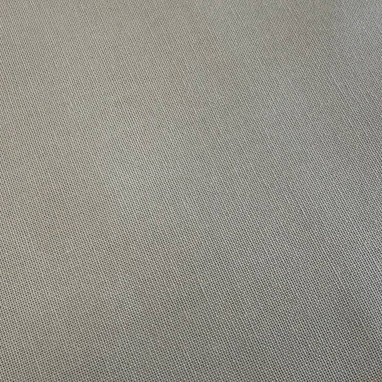 Close-up texture of beige cotton canvas fabric