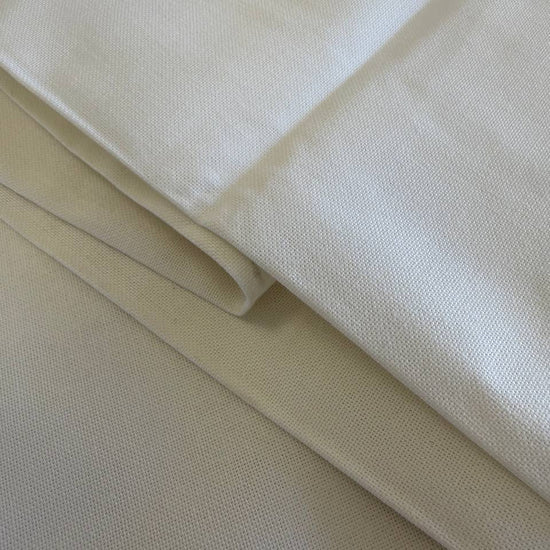 Close-up texture of white cotton canvas fabric