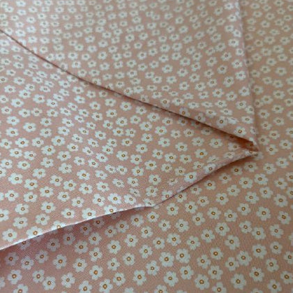 Cream cotton fabric with peach floral print and green leaves, quilting cotton by Moda Potted collection