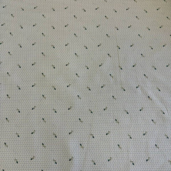 Light blue cotton fabric with small delicate floral print by Stof, soft quilting fabric