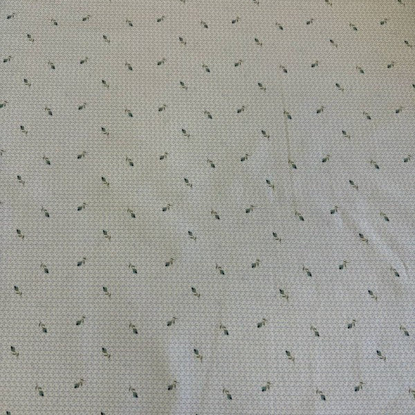 Light blue cotton fabric with small delicate floral print by Stof, soft quilting fabric