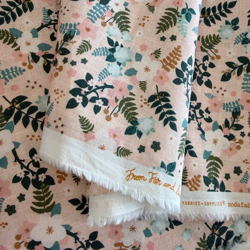 Blush pink cotton fabric with green and teal floral leaf print by Moda, quilting fabric