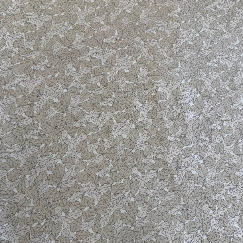Cream cotton fabric with delicate leaf print pattern