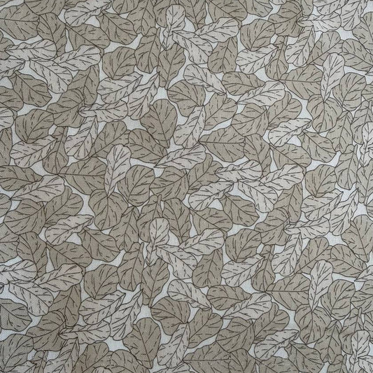 Cream cotton fabric with delicate leaf print pattern