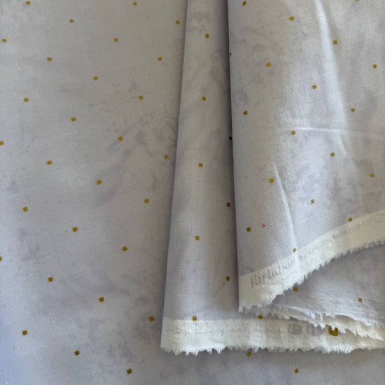 White cotton fabric with small metallic gold dots, Flirtation collection by Zen Chic for Moda