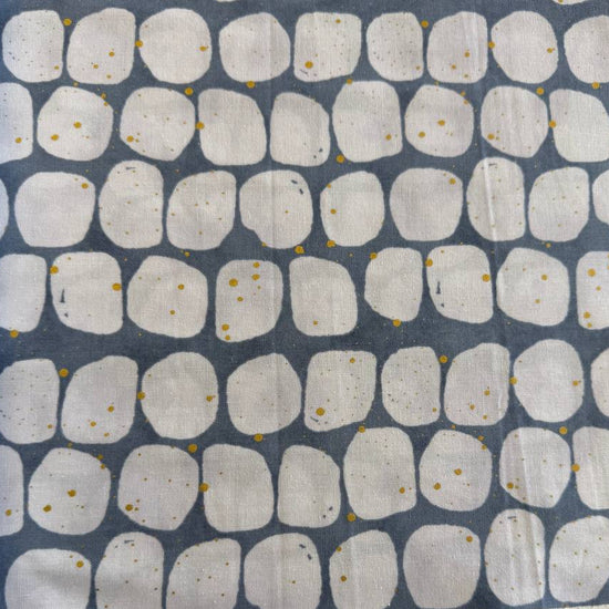 Blue and white pebble print cotton fabric with gold speckles by Zen Chic Flirtation collection