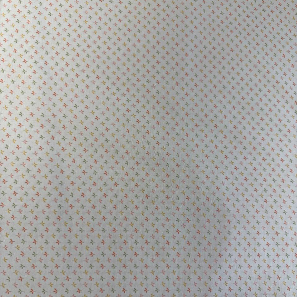 Flower Girl cotton fabric by Sew Quilty Life with small pastel leaf sprigs on cream background