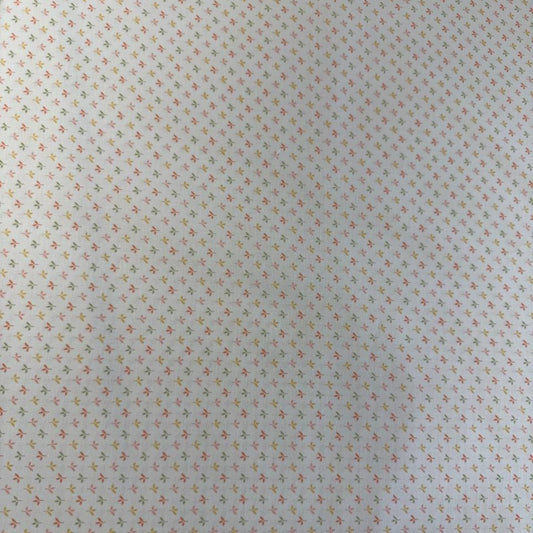 Flower Girl cotton fabric by Sew Quilty Life with small pastel leaf sprigs on cream background