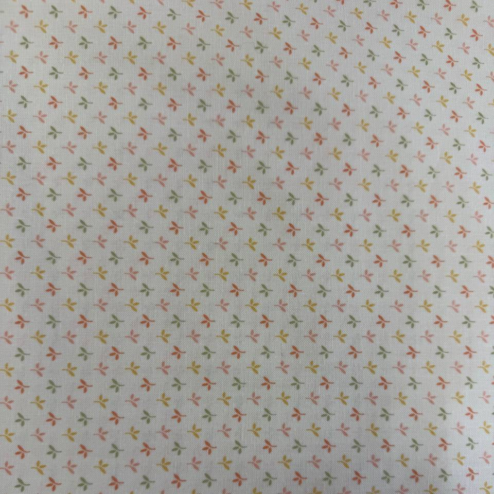 Flower Girl cotton fabric by Sew Quilty Life with small pastel leaf sprigs on cream background