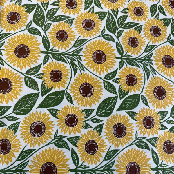 Sunflower cotton fabric by Katharine Watson for Moda, Garden Series, cream background with yellow sunflowers and green leaves