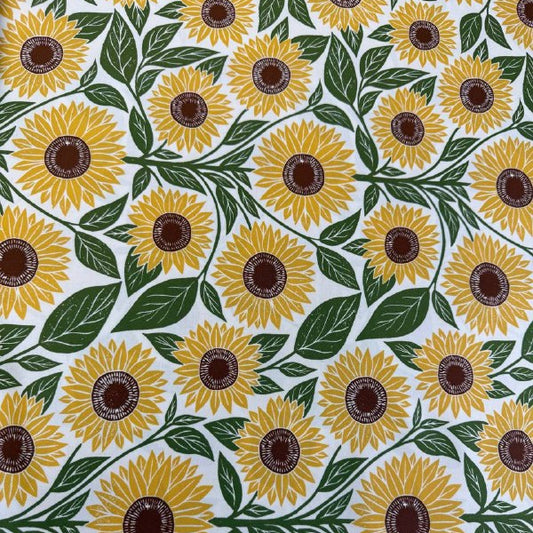 Sunflower cotton fabric by Katharine Watson for Moda, Garden Series, cream background with yellow sunflowers and green leaves