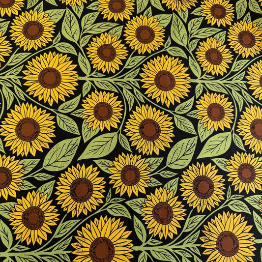 Sunflower cotton fabric with yellow sunflowers and green leaves on black background Garden Series by Katharine Watson Moda