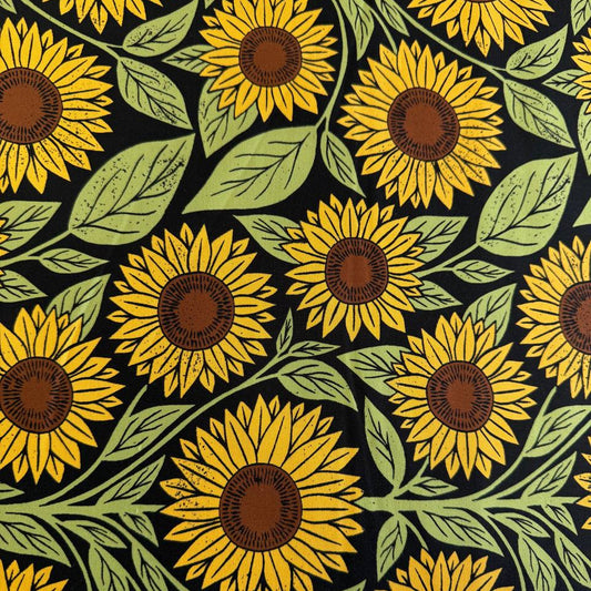Sunflower cotton fabric with yellow sunflowers and green leaves on black background Garden Series by Katharine Watson Moda