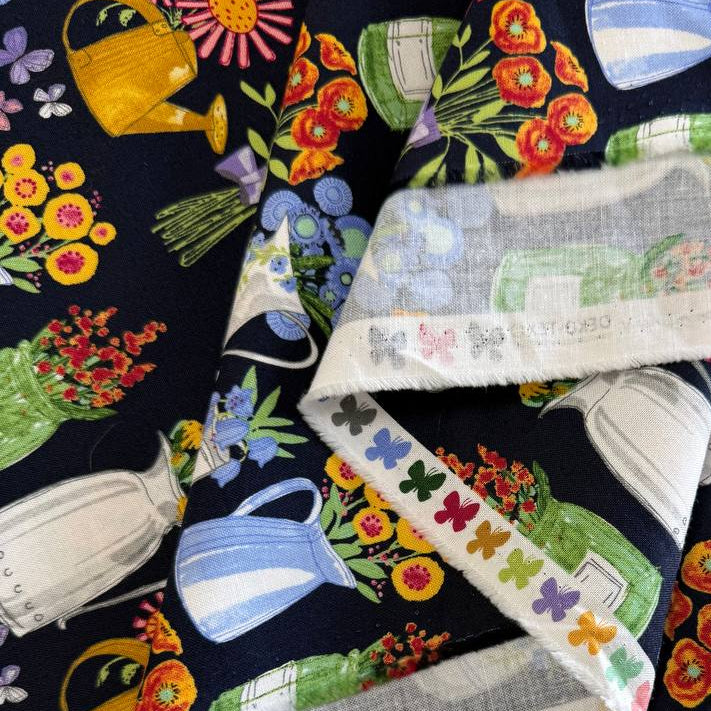 Superbloom fabric by Robin Pickens for Moda featuring colorful flowers in jars on navy background