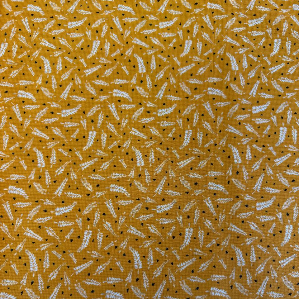 Mustard cotton fabric with white fern leaf print quilting cotton