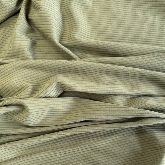 Soft bamboo rib knit fabric with fine vertical ribs, excellent stretch, and a smooth texture, available in multiple colours.