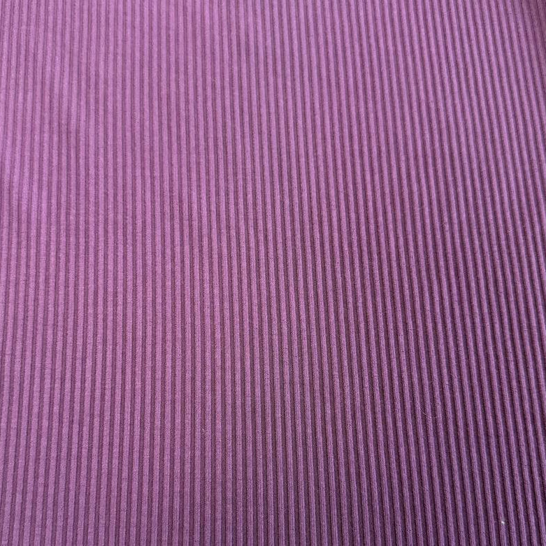 Soft bamboo rib knit fabric with fine vertical ribs, excellent stretch, and a smooth texture, available in multiple colours.