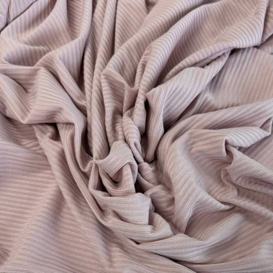 Soft bamboo rib knit fabric with fine vertical ribs, excellent stretch, and a smooth texture, available in multiple colours.