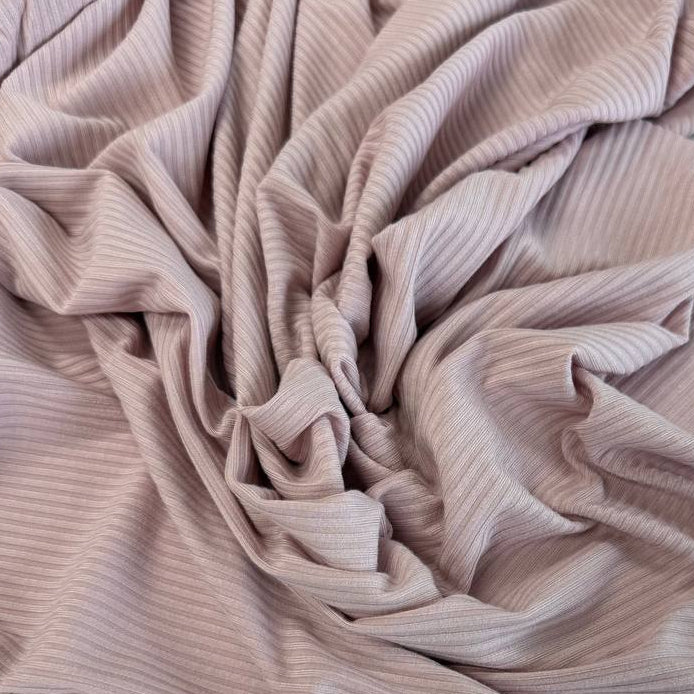 Soft bamboo rib knit fabric with fine vertical ribs, excellent stretch, and a smooth texture, available in multiple colours.