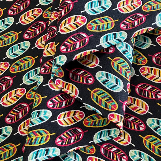 Emma & Mila BF Feathers black quilting cotton fabric with colorful geometric feather print