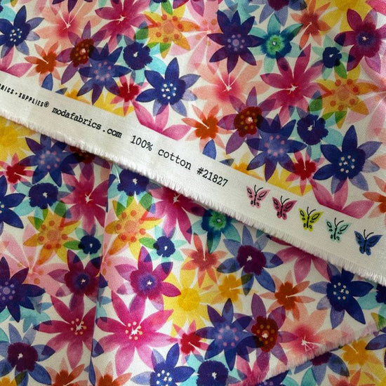 Flower Patches 1827-11 multi floral quilting cotton by Amarilys Henderson for Moda Fabrics, colorful star-shaped flowers on light pink background