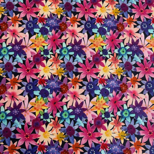 Colorful watercolor floral cotton fabric with layered pink, purple, blue, yellow and coral flowers on dark background – Flower Patches by Amarilys Henderson for Moda