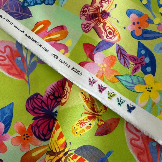 Flower Patches fabric by Amarilys Henderson for Moda, colorful butterfly floral patchwork on green background quilting cotton 521820-15