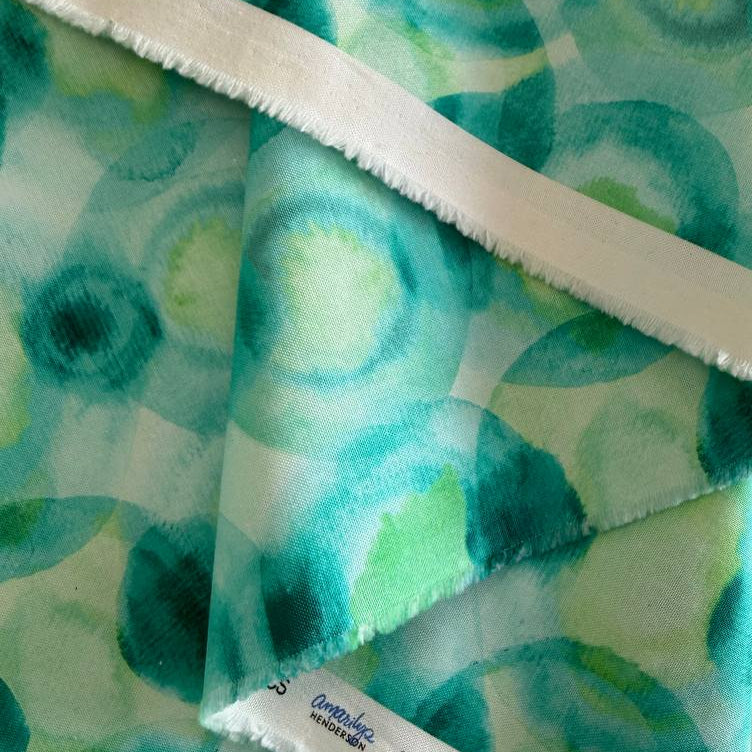 Flower Patches fabric by Amarilys Henderson for Moda, aqua green watercolor dots blender quilting cotton 521826-12