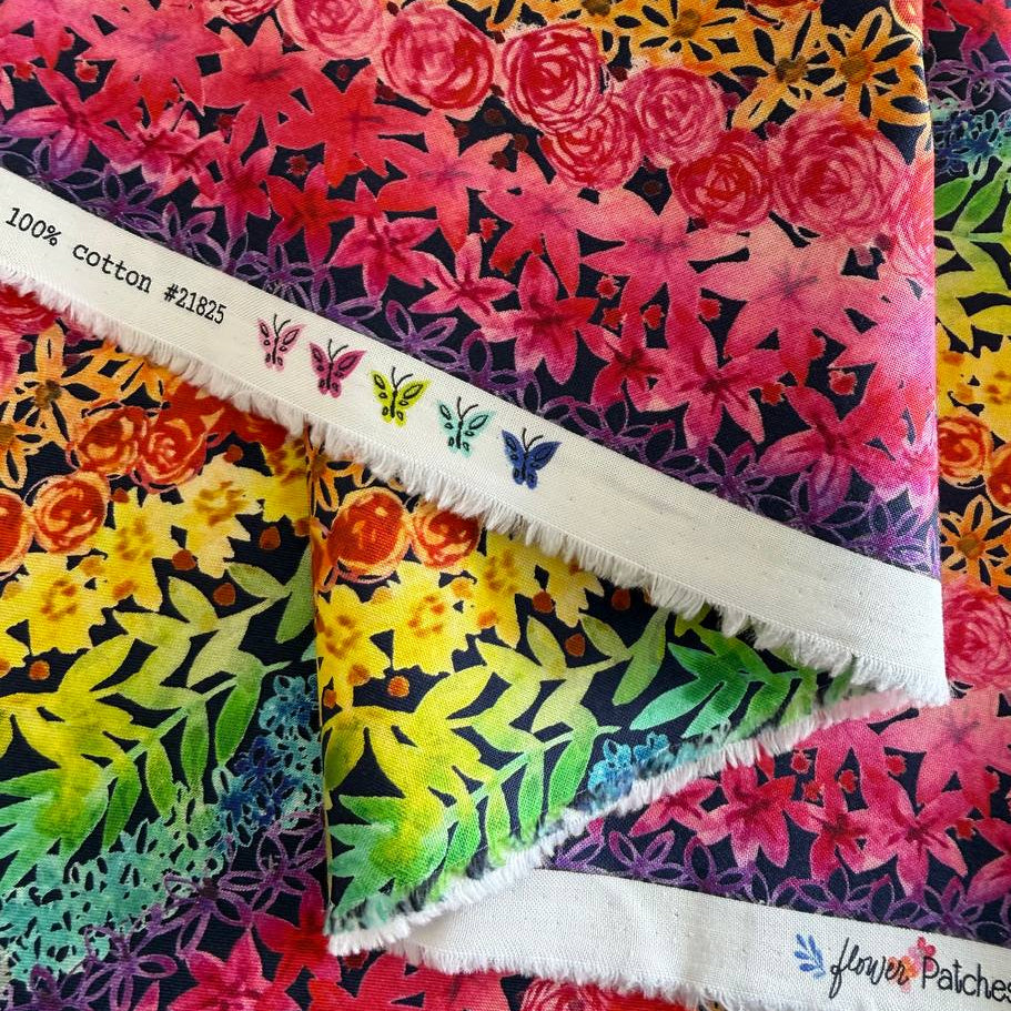 Flower Patches fabric by Amarilys Henderson for Moda, rainbow floral stripe on dark background quilting cotton 521825-12