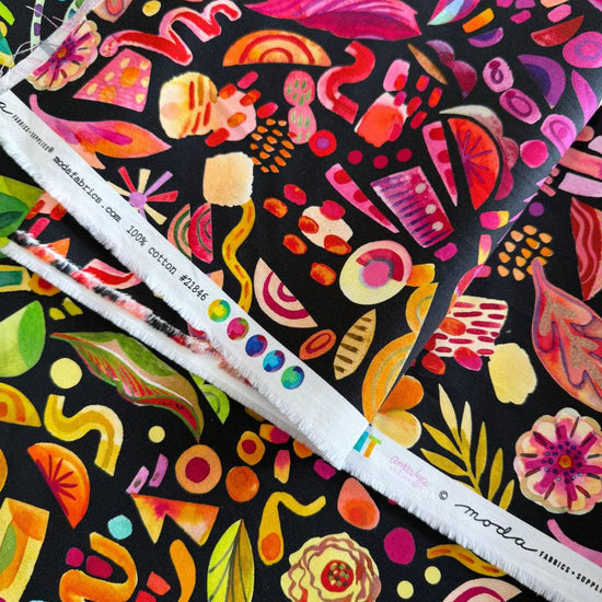 Radiant Midnight fabric by Amarilys Henderson for Moda, colorful abstract shapes on black background quilting cotton 521846-12