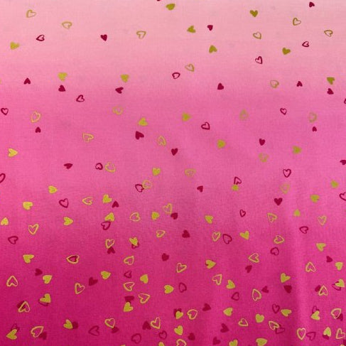 Pink ombre cotton fabric with small metallic gold and red hearts by Moda Fabric