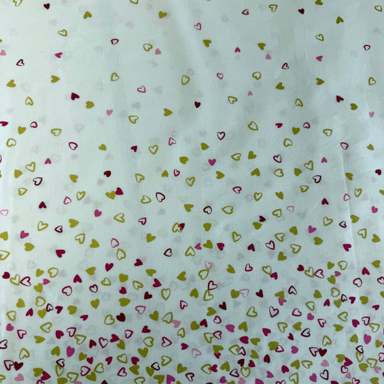 Off white cotton fabric with pink red and metallic gold hearts I Heart Ombre Metallic Moda Fabrics