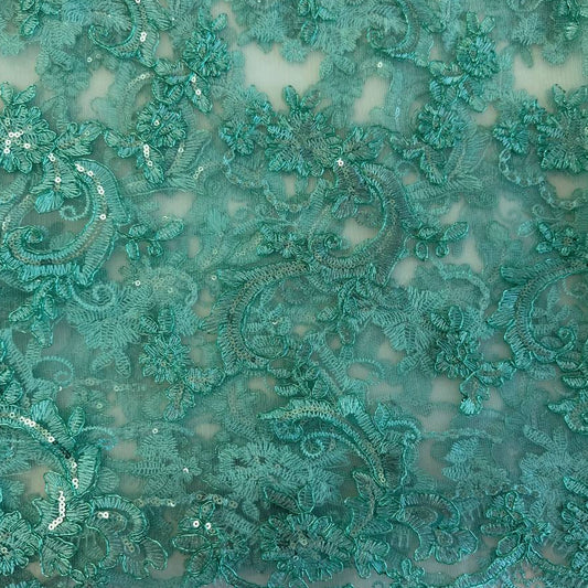 Mint green embroidered floral lace with shimmering sequins on a soft sheer mesh background, featuring elegant scalloped edges, ideal for bridal wear, evening gowns, and formal sewing projects.