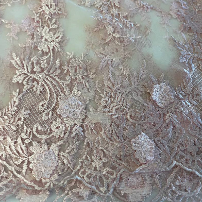 Soft blush pink 3D floral embroidered lace on a sheer mesh base with elegant scalloped edges, perfect for bridal gowns, evening dresses, veils, and luxury sewing projects.