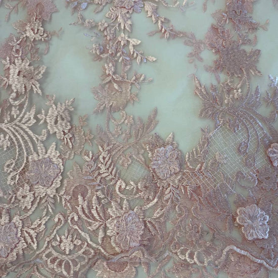 Soft blush pink 3D floral embroidered lace on a sheer mesh base with elegant scalloped edges, perfect for bridal gowns, evening dresses, veils, and luxury sewing projects.