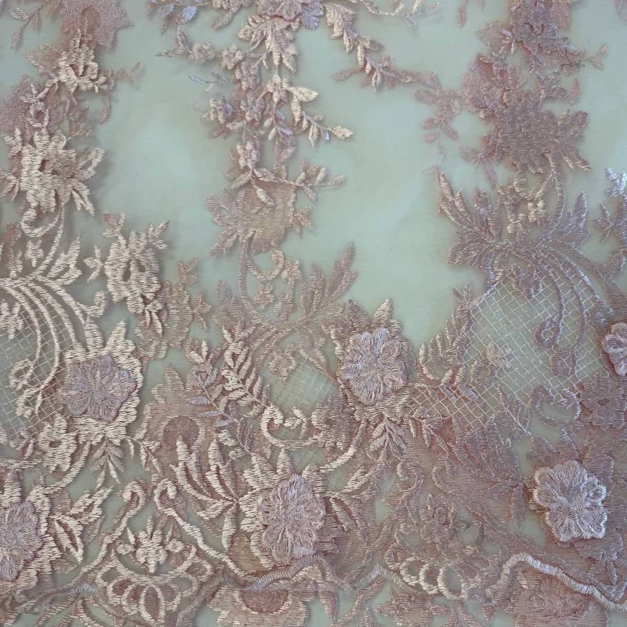 Soft blush pink 3D floral embroidered lace on a sheer mesh base with elegant scalloped edges, perfect for bridal gowns, evening dresses, veils, and luxury sewing projects.