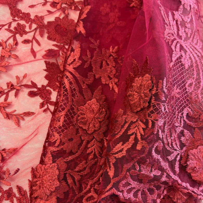 Elegant dark red (burgundy) 3D floral embroidered lace on a soft sheer mesh base with a delicate scalloped edge, ideal for evening gowns, formal dresses, bridal designs, and luxury sewing projects.