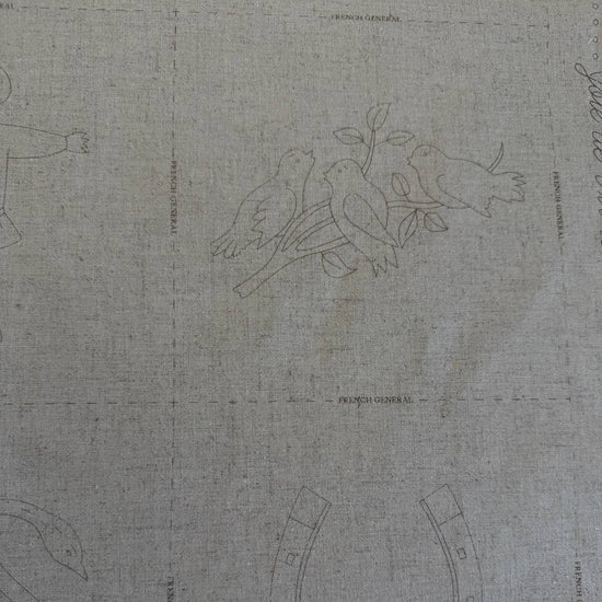 Joie De Vivre French General cotton fabric panel with vintage embroidery style illustrations on natural linen look background