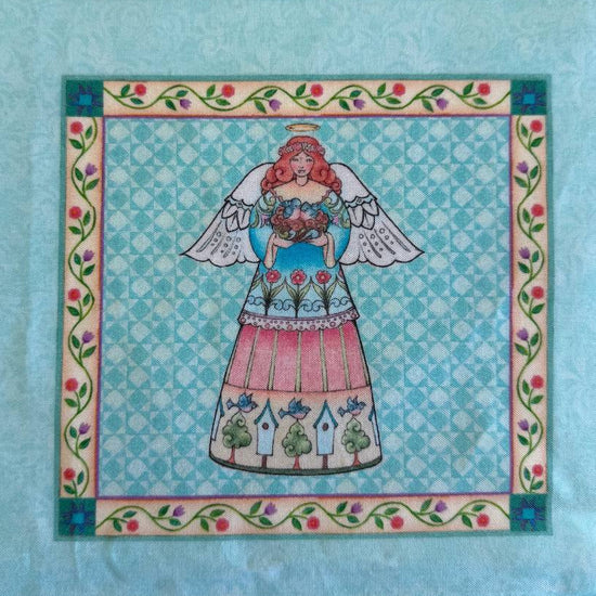 Garden Angels cotton fabric panel with six floral angel blocks on teal background quilting panel