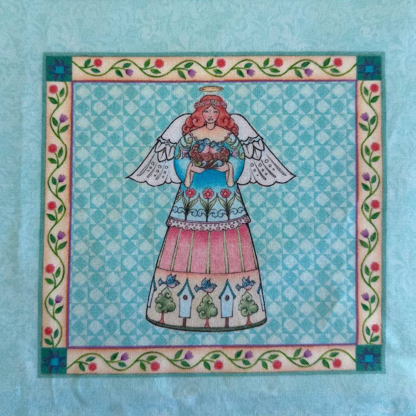 Garden Angels cotton fabric panel with six floral angel blocks on teal background quilting panel