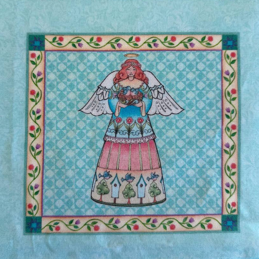 Garden Angels cotton fabric panel with six floral angel blocks on teal background quilting panel